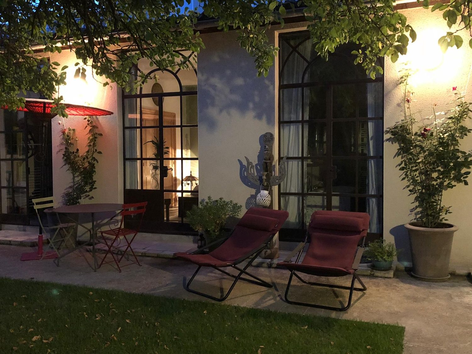 The terrace at dusk, garden side